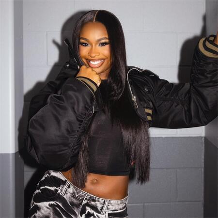 coco jones Middle Part Sleek Straight Hair