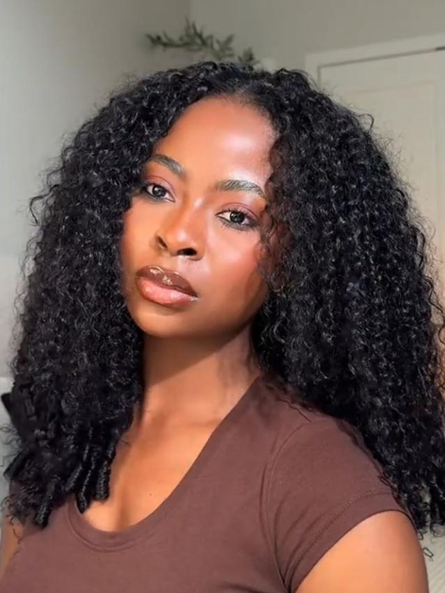 A model displays the UNice InvisiBlend V Part & 7x5 Bye Bye Knots Curly Texture Drawstring Human Hair Wig, showing a model with long curly hair and brown shirt and curly.