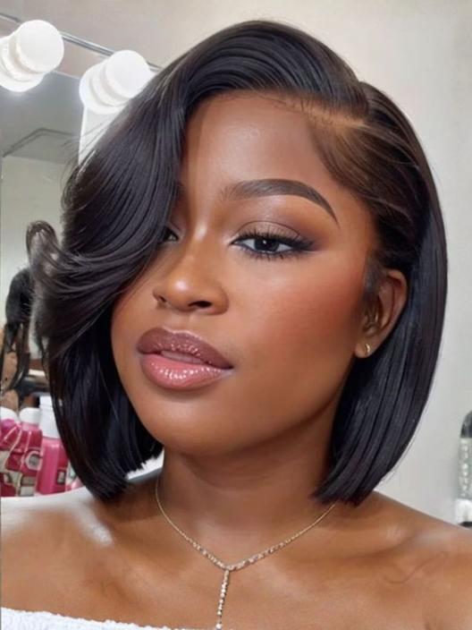 A model displays the UNice 7x5 Bye Bye Knots Natural Black & Black Cherry & Black with Caramel Blonde wig, showing a model with short hair and a white top and body wave.