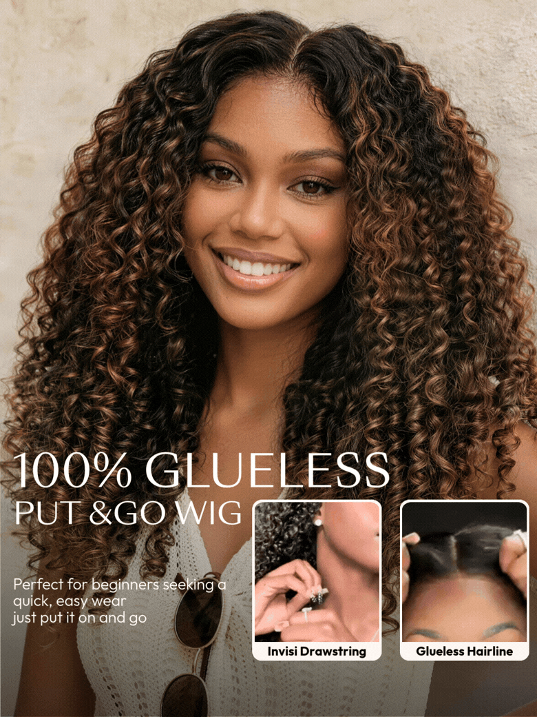 A woman with voluminous, Burmese curly wig styled in dark brown hair and glowing makeup poses indoors in a white blouse. She looks confidently at the camera, with a softly lit background and city lights visible through a window.