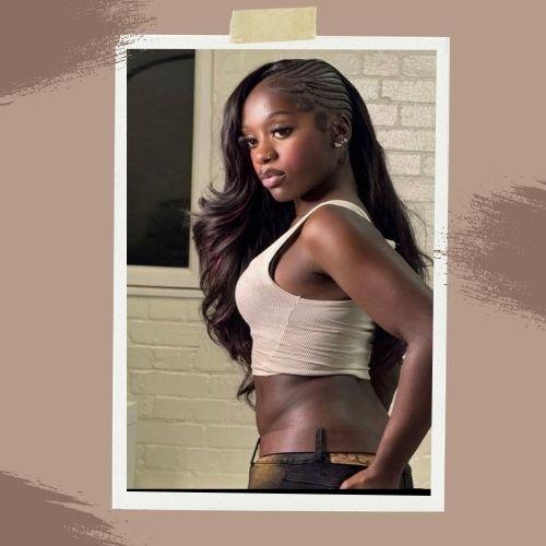Cassie braids hairstyle with long voluminous wavy hair