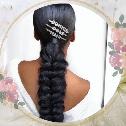 Thick fishtail braid wedding hairstyle for black hair with bridal hair clip