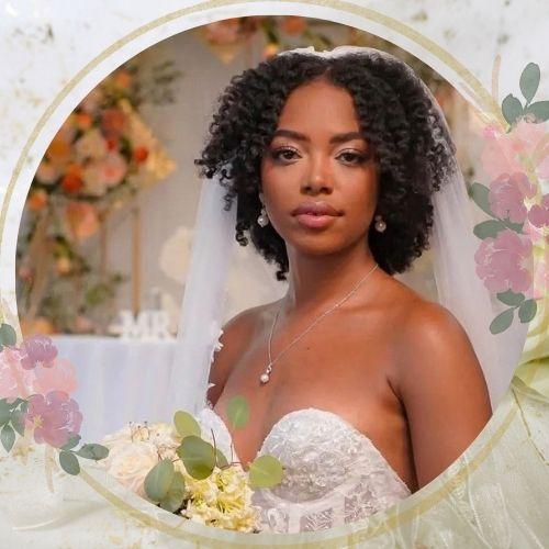 Defined twist out natural wedding hairstyle for black women with bridal veil