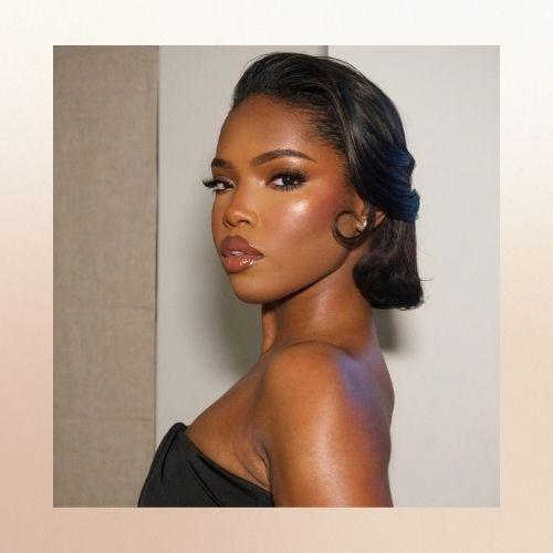 Close-up portrait of Ryan Destiny with a sleek, sculpted bob hairstyle.