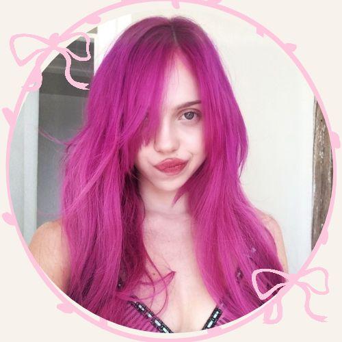 Adela Jergova with vibrant neon magenta pink long wavy hair