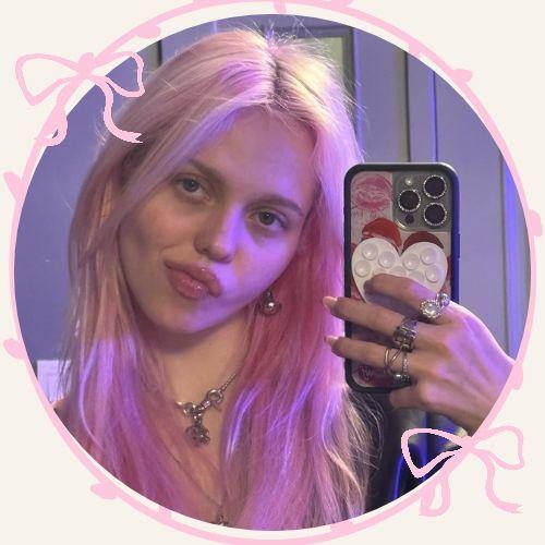 Adela Jergova with pastel light faded pink wavy hair