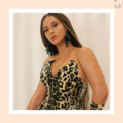 Beyoncé wearing long box braids in a leopard print dress