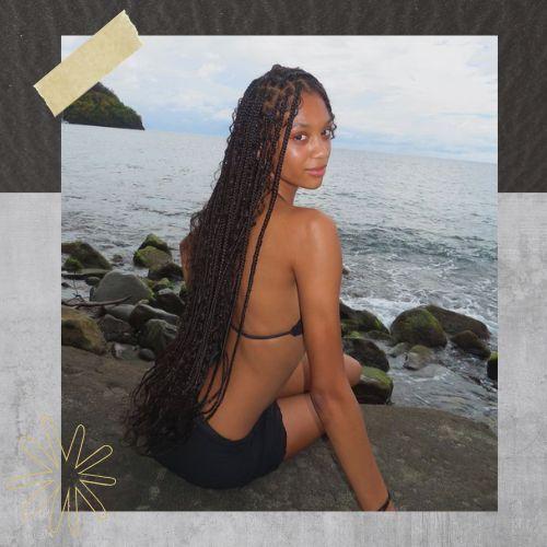 Long box braids black hairstyles for long hair styled on the beach