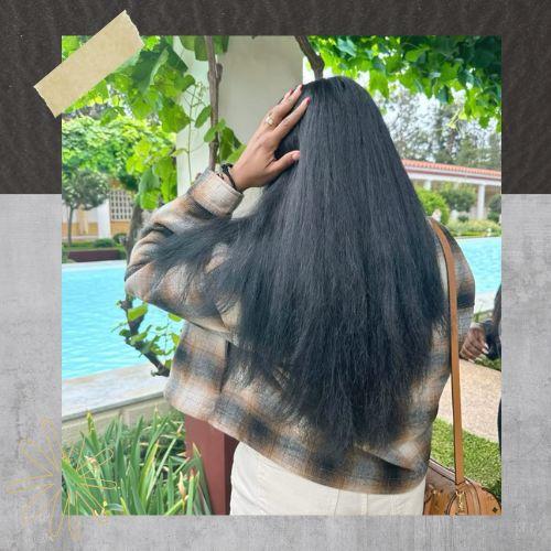 Bone straight waist-length silk press black hairstyles for long hair back view