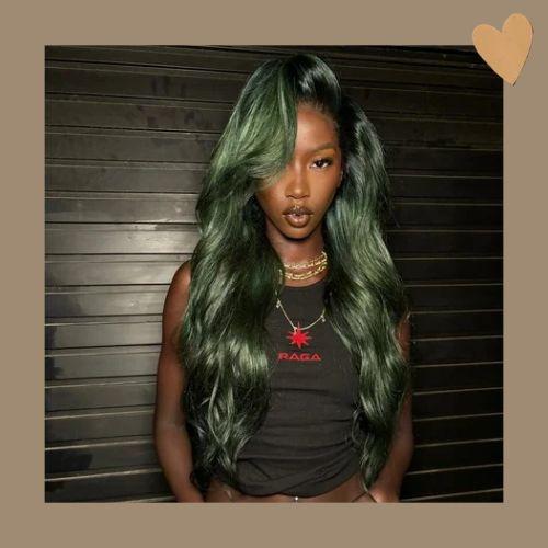 Anok Yai with side-swept voluminous emerald green wave hair
