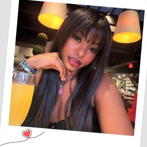 Long silky straight sew-in weave hairstyles with Birkin bangs